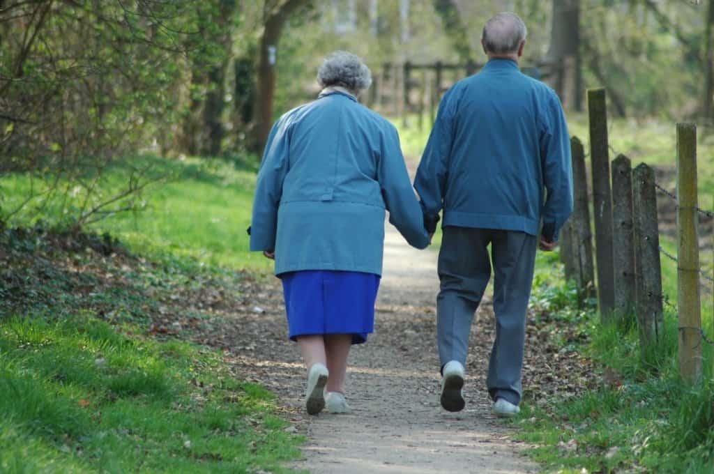 Couple walking and holding hands